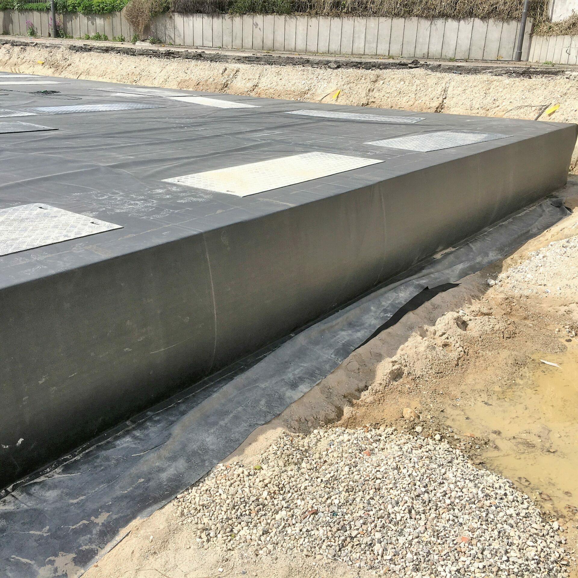 Impermeable membrane, stormwater detention tank